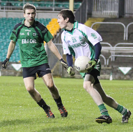 Action from the division three football league play-off match against Naomh Bríd.