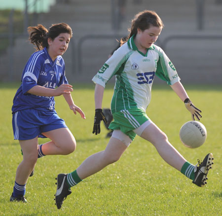 Action from the 2012 ladies under 14 match between Aodh Ruadh and Four Masters.