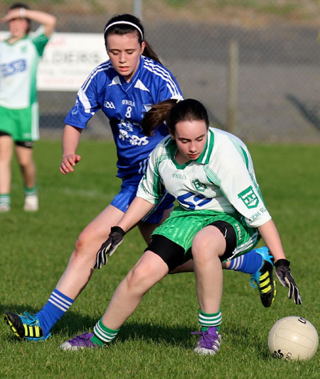 Action from the 2012 ladies under 14 match between Aodh Ruadh and Four Masters.