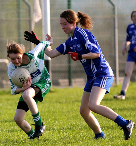 Action from the 2012 ladies under 14 match between Aodh Ruadh and Four Masters.