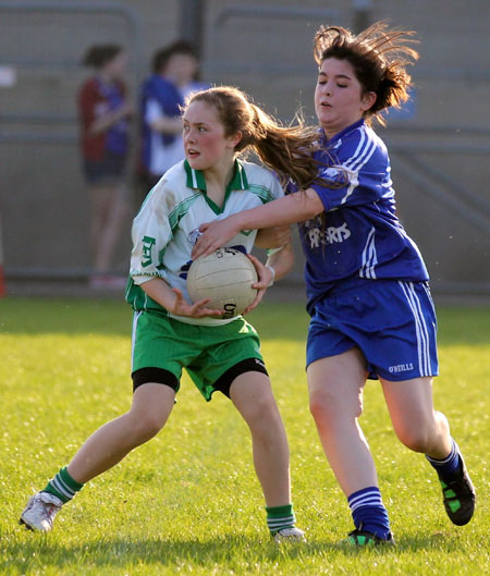 Action from the 2012 ladies under 14 match between Aodh Ruadh and Four Masters.