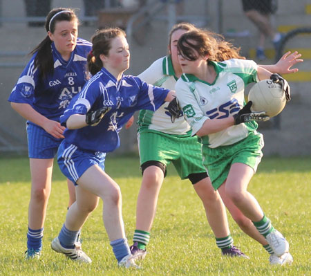 Action from the 2012 ladies under 14 match between Aodh Ruadh and Four Masters.