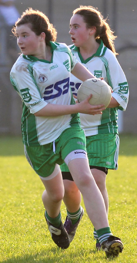 Action from the 2012 ladies under 14 match between Aodh Ruadh and Four Masters.