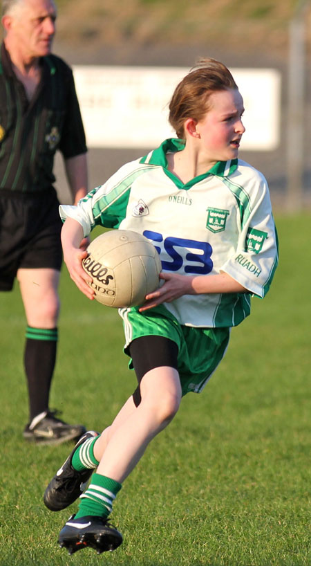 Action from the 2012 ladies under 14 match between Aodh Ruadh and Four Masters.