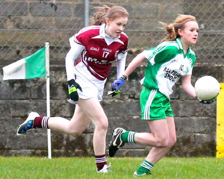 Action from the 2012 ladies under 14 match between Aodh Ruadh and Saint Naul's.