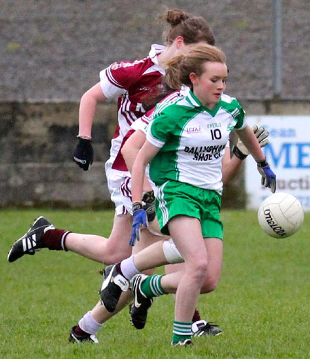 Action from the 2012 ladies under 14 match between Aodh Ruadh and Saint Naul's.