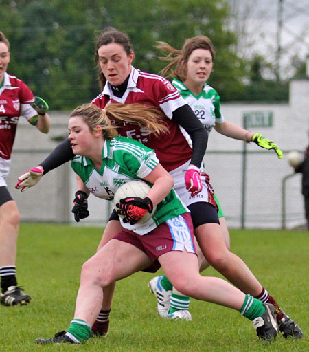 Action from the 2012 ladies under 14 match between Aodh Ruadh and Saint Naul's.