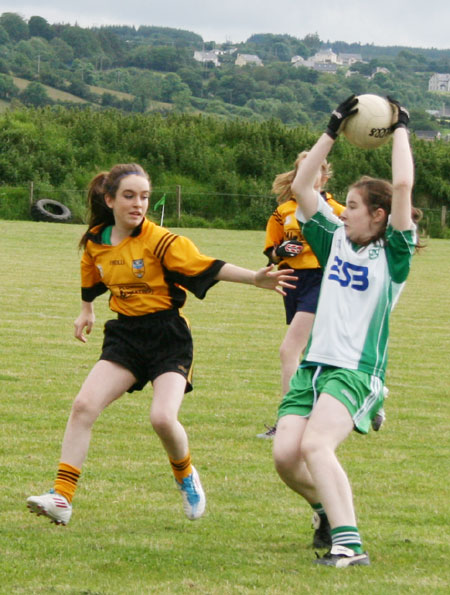 Action from the ladies under 14 match between Aodh Ruadh and Malin.