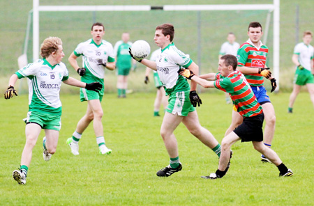 Action from the division three senior reserve football league match against Burt.