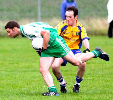 Action from the division three senior football league match against Burt.