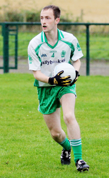 Action from the division three senior football league match against Burt.