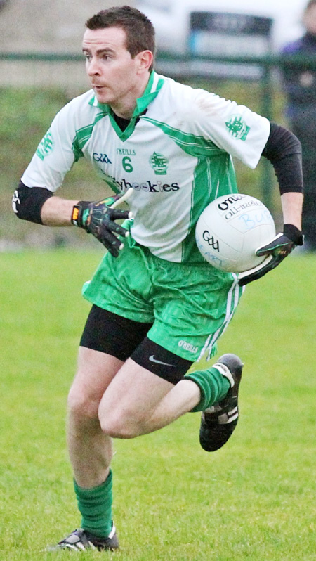 Action from the division three senior football league match against Burt.