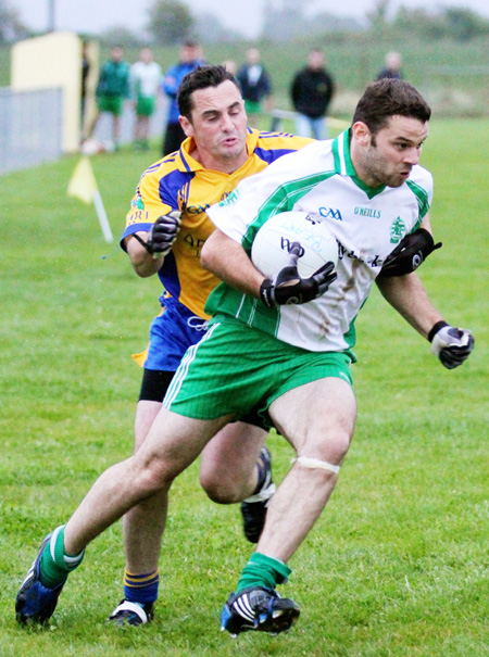 Action from the division three senior football league match against Burt.