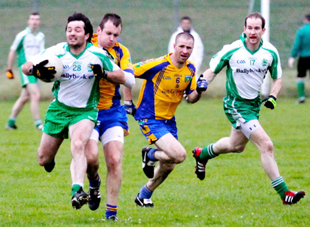 Action from the division three senior football league match against Burt.