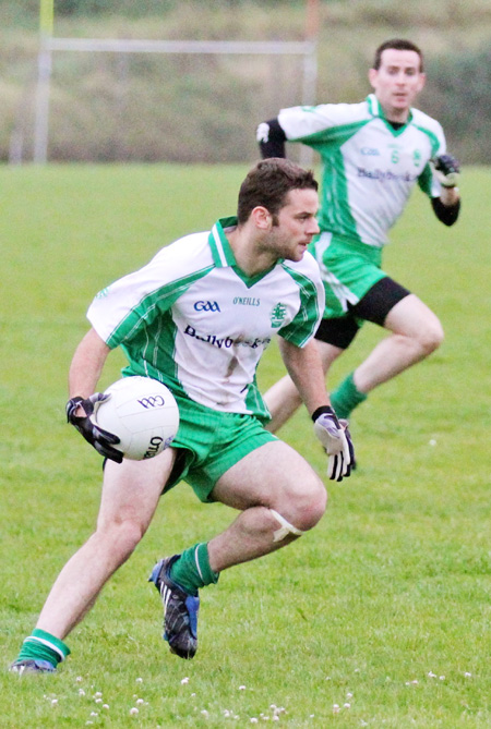 Action from the division three senior football league match against Burt.