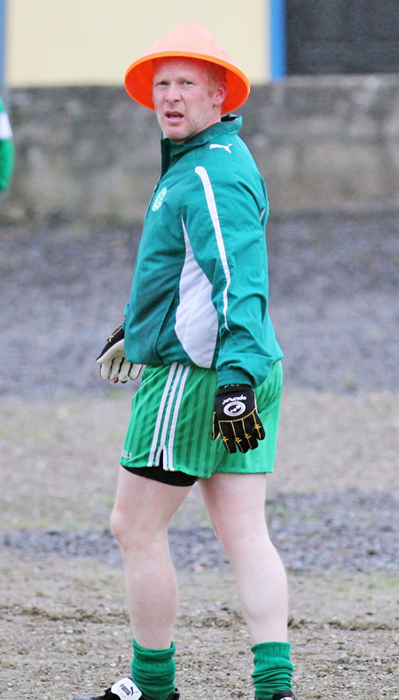 Action from the division three senior football league match against Burt.