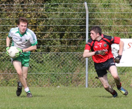 Action from the intermediate reserve football championship game against Naomh Bríd.