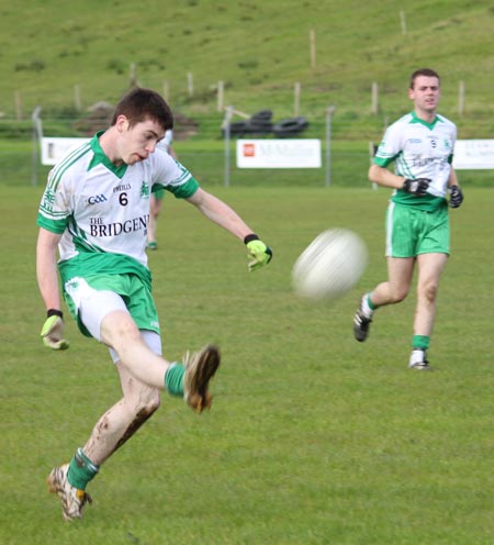 Action from the intermediate reserve football championship game against Naomh Bríd.