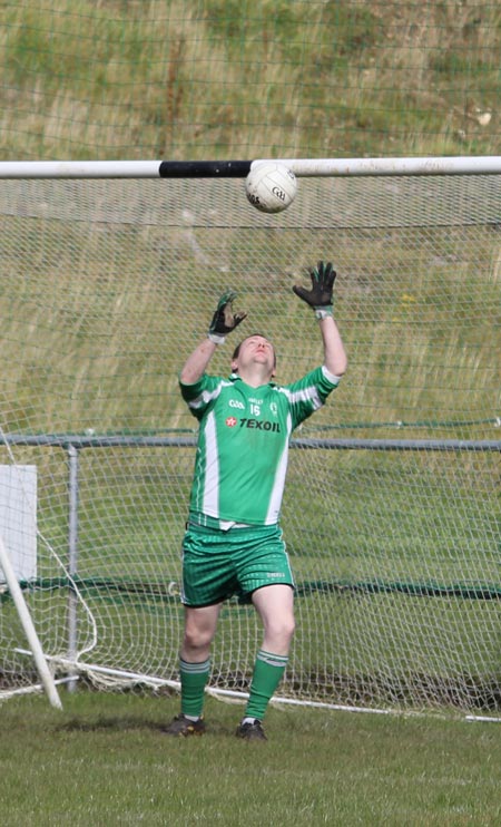 Action from the intermediate reserve football championship game against Naomh Bríd.