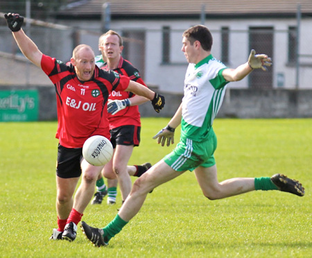 Action from the intermediate reserve football championship game against Naomh Bríd.