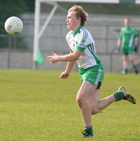 Action from the intermediate reserve football championship game against Naomh Bríd.