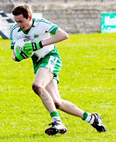 Action from the intermediate reserve football championship game against Naomh Bríd.