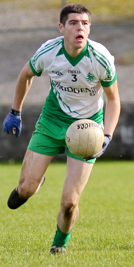 Action from the intermediate reserve football championship game against Naomh Bríd.