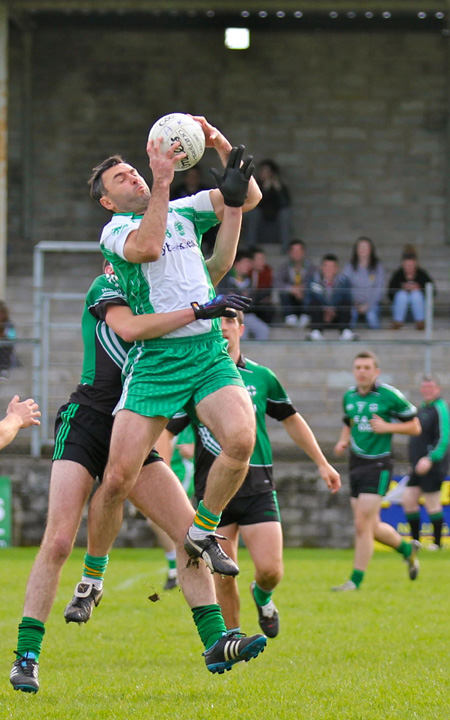 Action from the intermediate football championship match against Naomh Bríd.