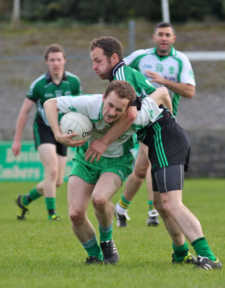 Action from the intermediate football championship match against Naomh Bríd.