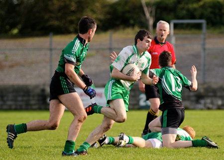 Action from the intermediate football championship match against Naomh Bríd.