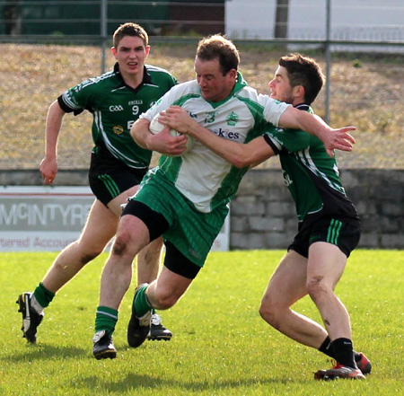 Action from the intermediate football championship match against Naomh Bríd.