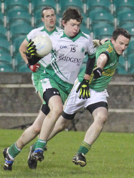 Action from the intermediate reserve football championship game against Naomh Columba.