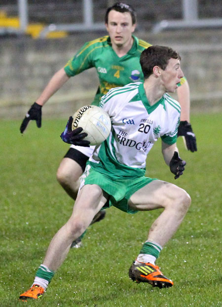 Action from the intermediate reserve football championship game against Naomh Columba.