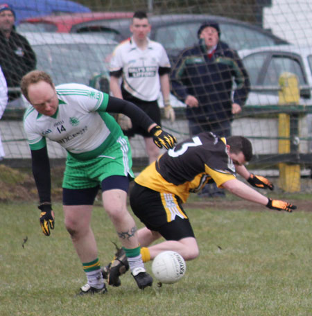 Action from the reserve division 3 senior game against Naomh Padraig, Lifford.