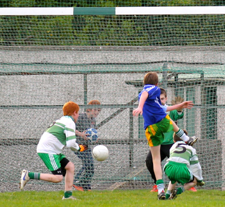 Action from the Bakery Cup final.