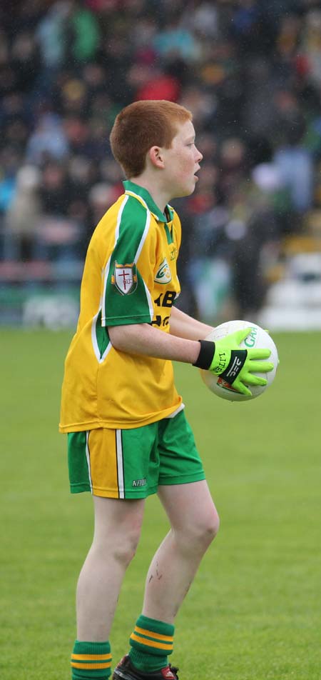 Aodh Ruadh's Shane McGrath plays the half-time mini-games at Breffni park.