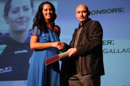 Senoir ladies team sponsor Maurice McLaughlin presents Niamh Gallagher with Ladies player of the year award.