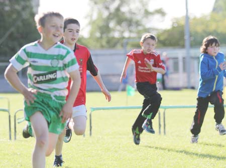 Action from the 2011 community games in Father Tierney Park.