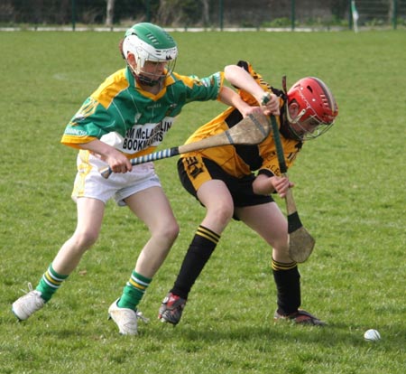 Action from the 2010 county Féile hurling finals.
