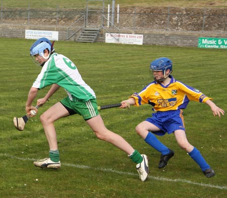Action from the 2010 county Féile hurling finals.