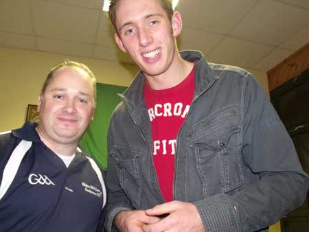 Other side of the camera Aodh Ruadh under 8 hurling manager and top photographer Eddie Lynch with Fennelly.