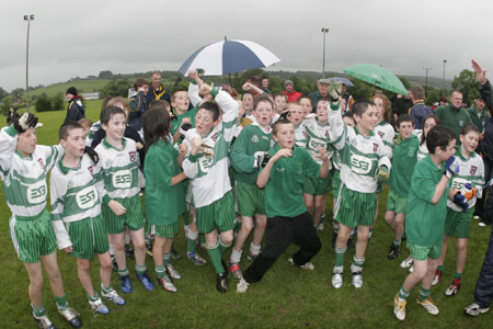 Aodh Ruadh players celebrate.