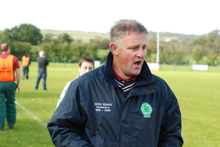 Aodh Ruadh chairman, Terence McShea, watches the game.